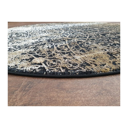 Low-angle close-up of navy and beige round rug showing surface texture and patterned finish, 160 cm