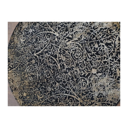 Close-up of round rug with navy, beige, and ivory botanical scroll design, 160 cm