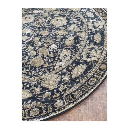 Angled detail of round rug showing navy border, floral pattern, and edge finish, 160 cm