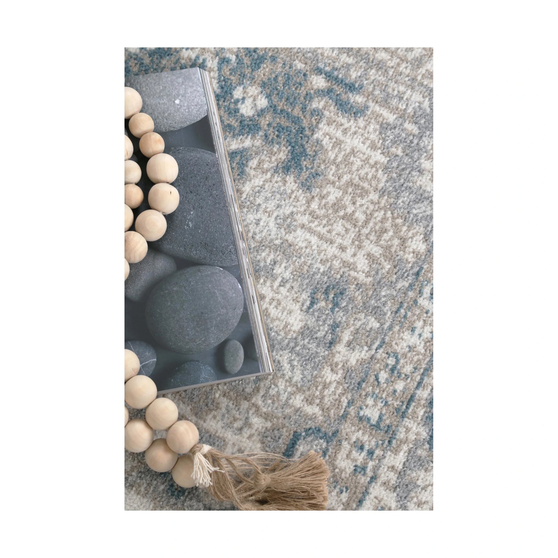 Texture and décor detail of Oporto Antwerp Cream & Blue Traditional Rug with muted blue pattern, soft pile and natural bead styling, 230 x 160 cm