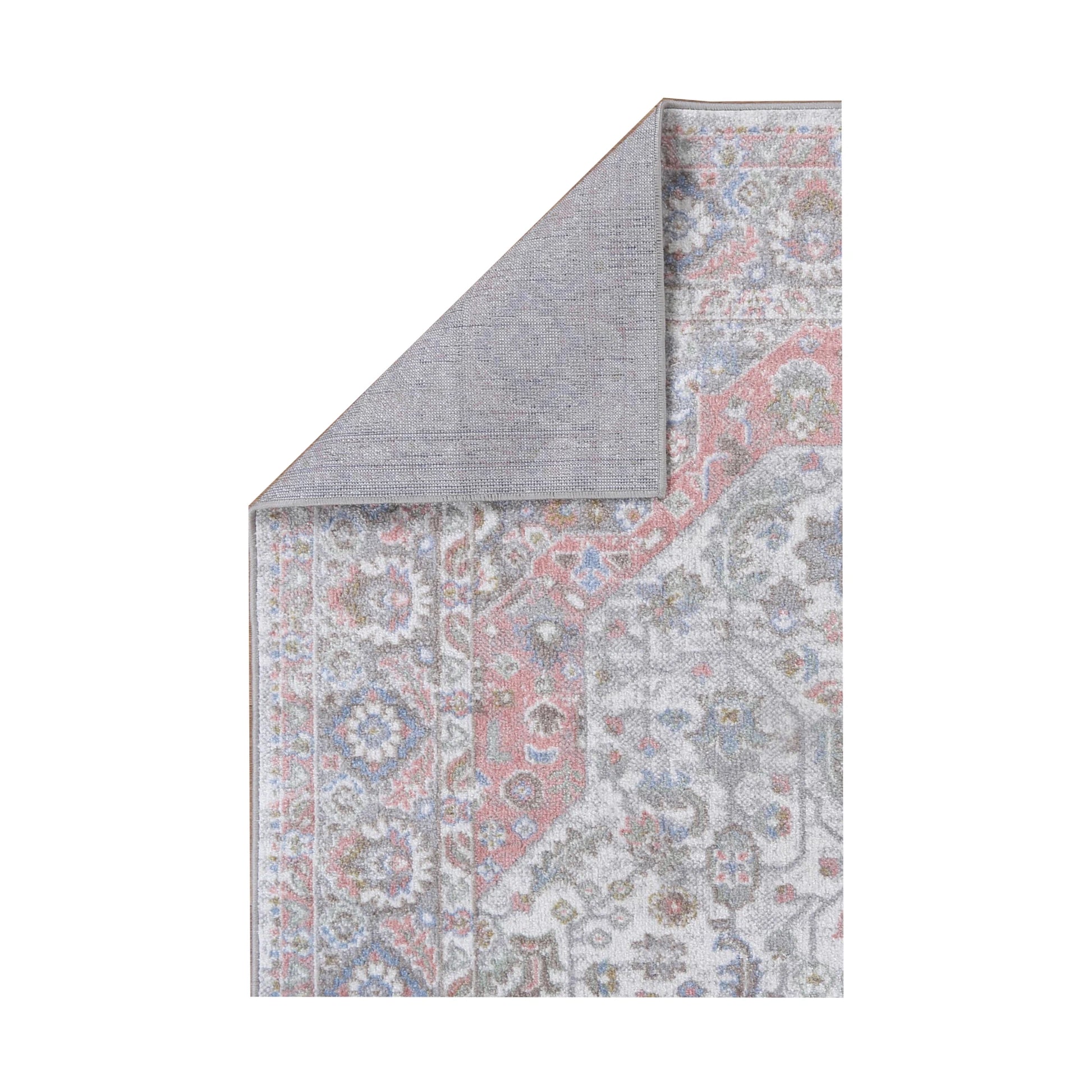 Folded reverse backing detail of Oporto Bremen Blush & Blue Traditional Rug with cream-grey field and blush-blue border, 290 x 200 cm