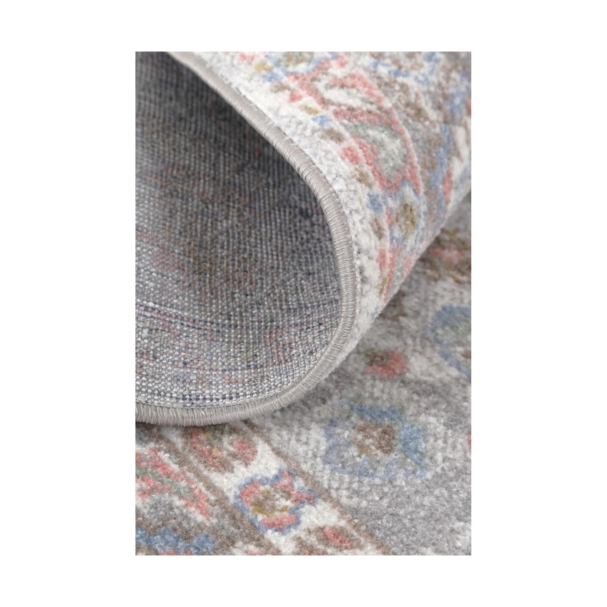 Rolled edge and backing detail of Oporto Bremen Blush & Blue Traditional Rug showing soft pile and bound edge, 290 x 200 cm