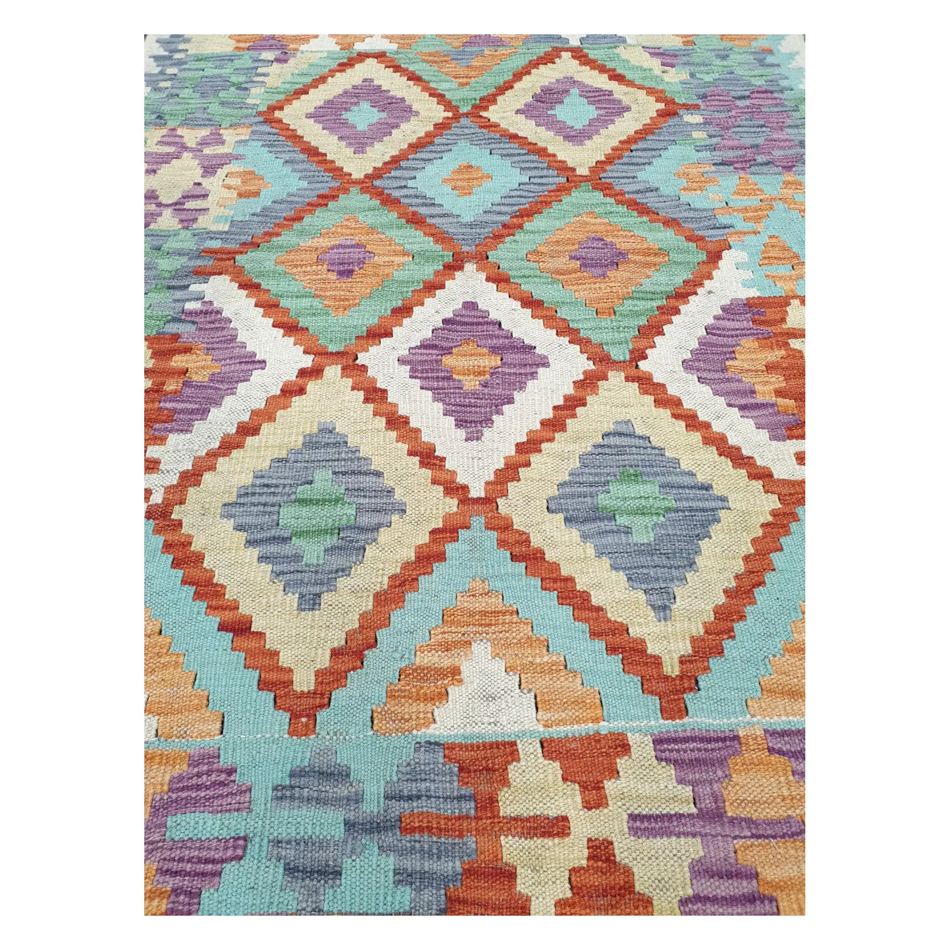 Close-up of Chobi Kilim rug with pastel diamond lattice motifs in coral, mint, lavender, and aqua, 133 x 100 cm