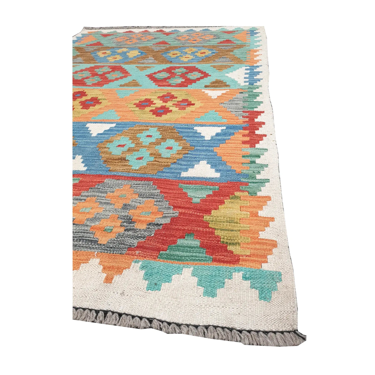 Angled corner detail of Afghan Chobi kilim showing grey fringe, ivory border and multicolour geometric bands