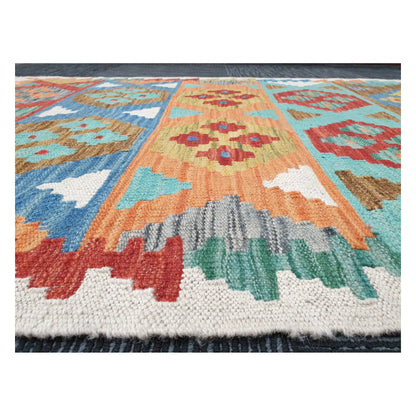 Low-angle close-up of Afghan Chobi Kilim showing wool flatweave texture and multicolour geometric pattern, 150 x 103 cm