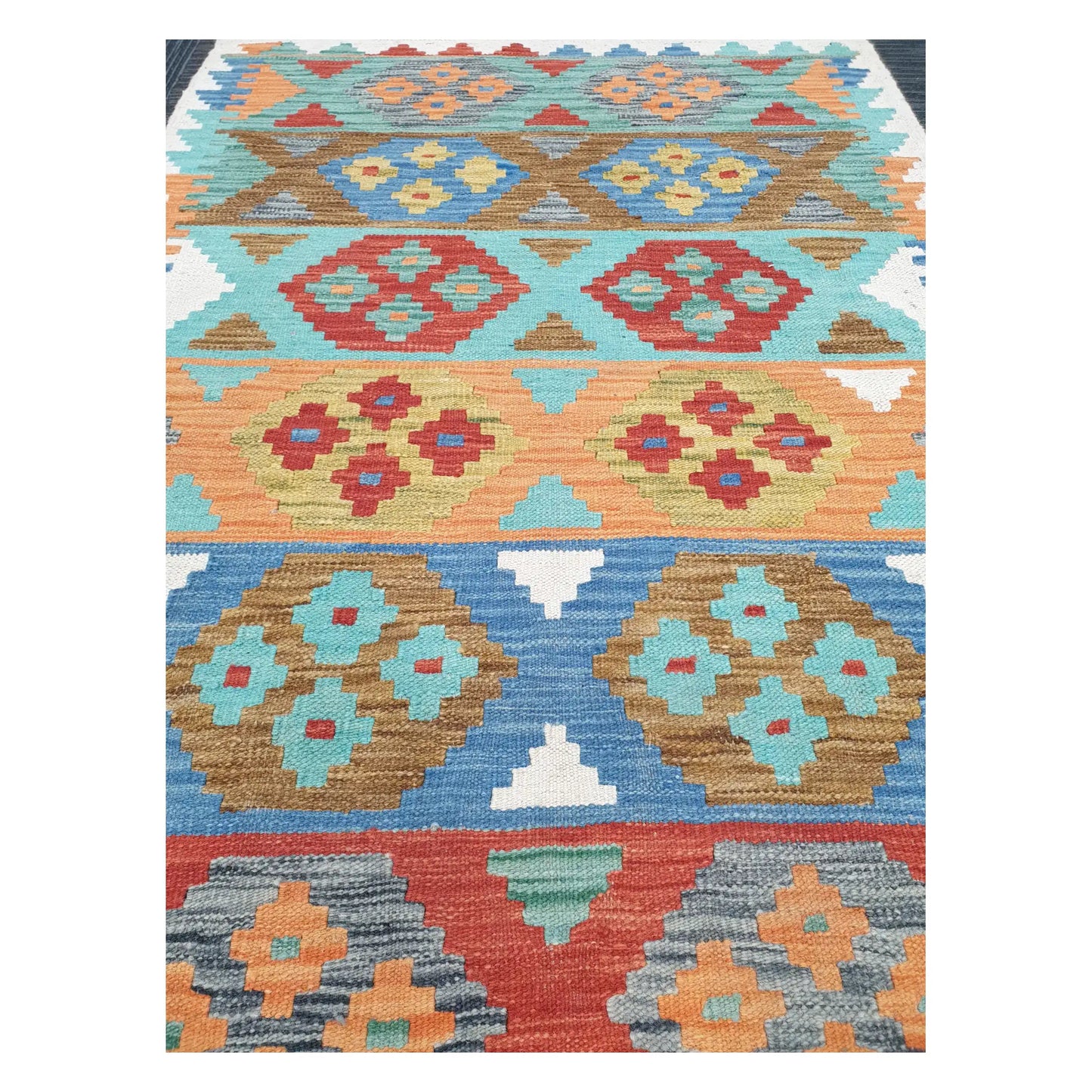 Close-up of Chobi Kilim rug with pastel geometric bands, rosette motifs, and tribal detailing, 150 x 103 cm