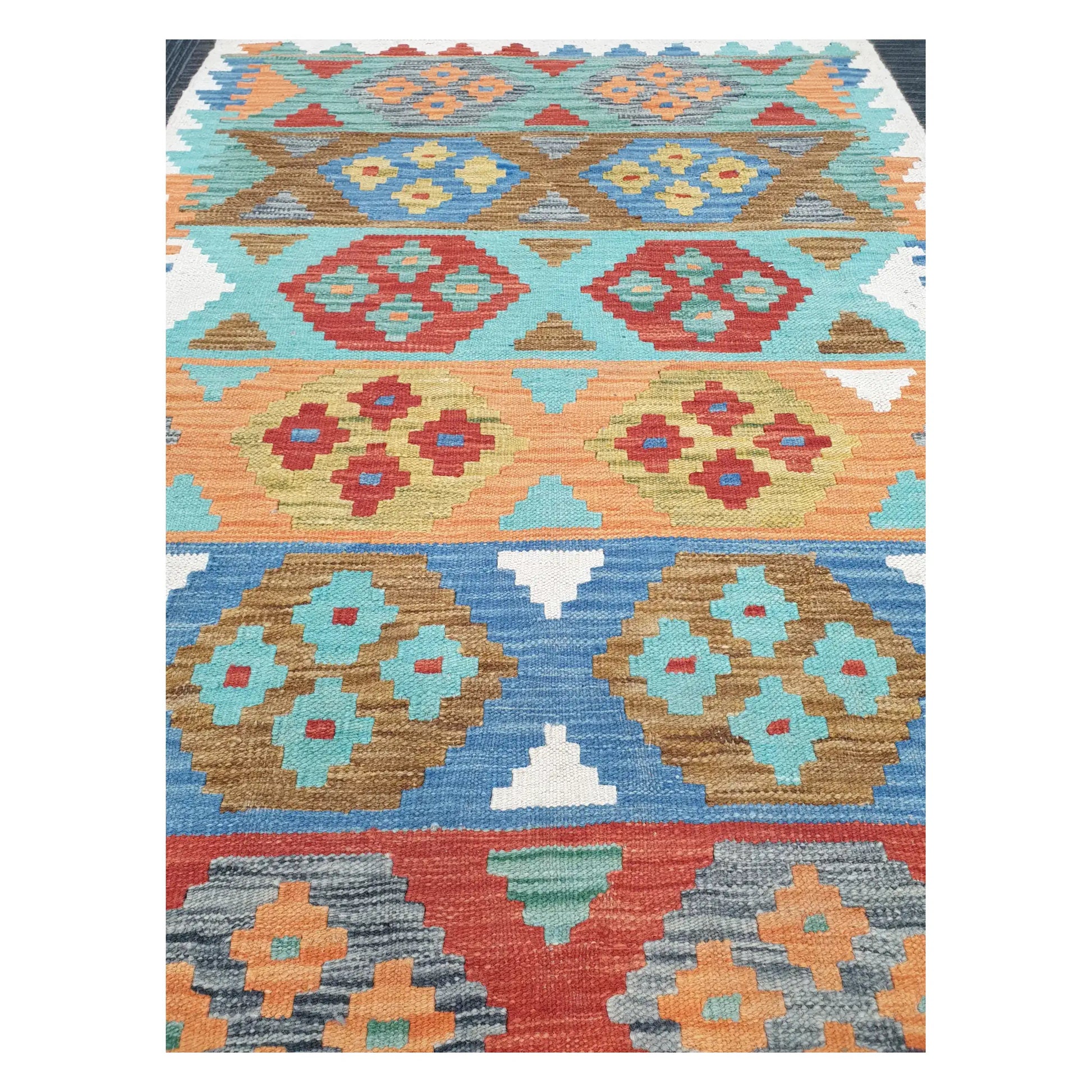 Close-up of Chobi Kilim rug with pastel geometric bands, rosette motifs, and tribal detailing, 150 x 103 cm