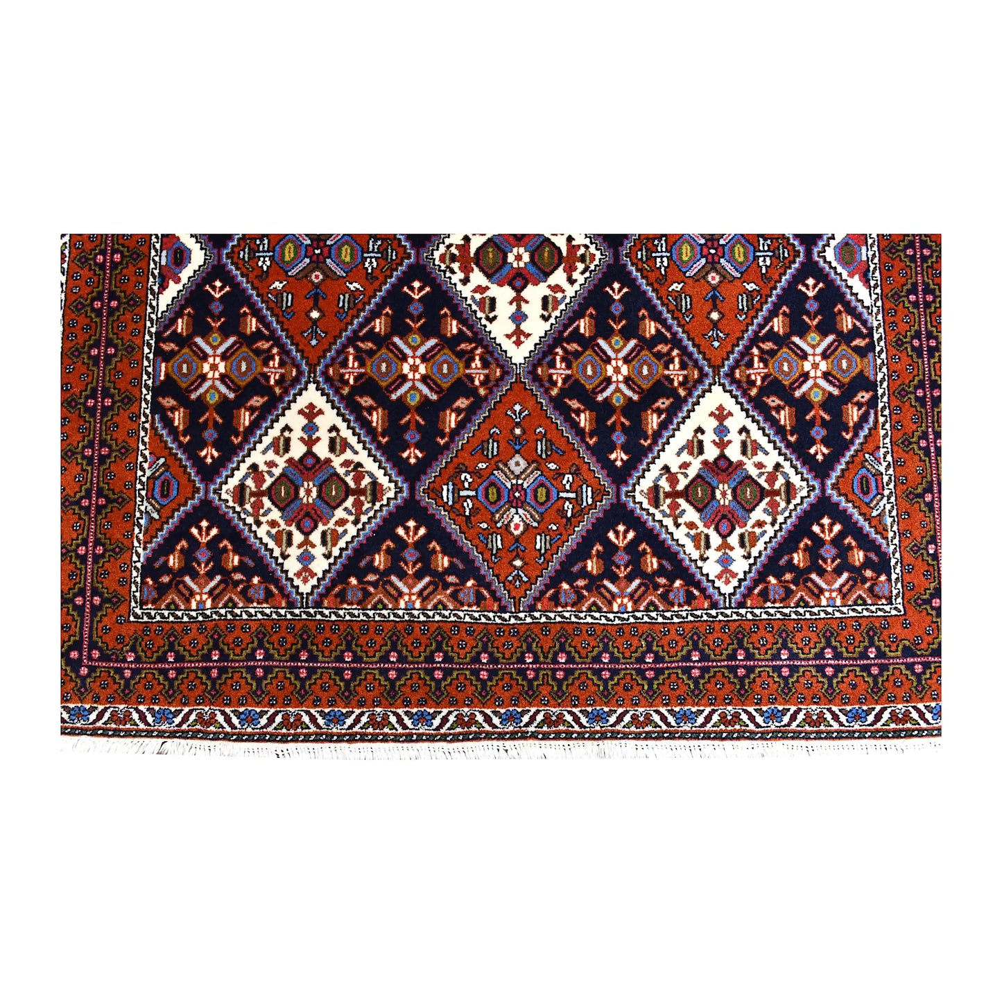 Fringe and end-border detail of Persian Afshar rug with rust-red, ivory and blue geometric motifs