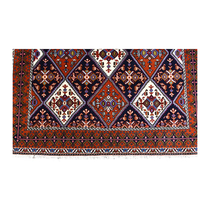 Fringe and end-border detail of Persian Afshar rug with rust-red, ivory and blue geometric motifs