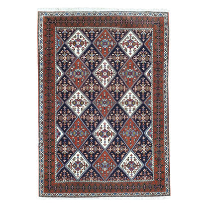 Persian Afshar hand-knotted wool rug 180 x 124 cm shown in straightened full view with red and blue diamond medallion design