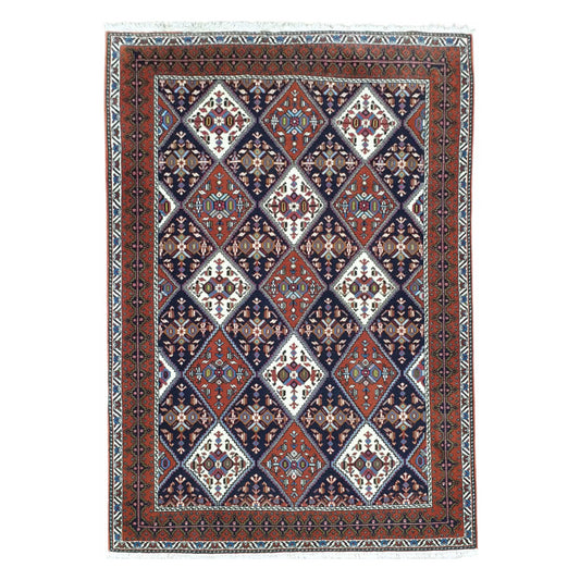 Persian Afshar hand-knotted wool rug 180 x 124 cm shown in straightened full view with red and blue diamond medallion design
