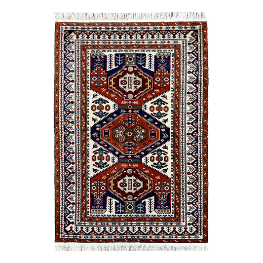 Full view of Persian Ardabil rug with three geometric medallions on an ivory field, 220 x 140 cm