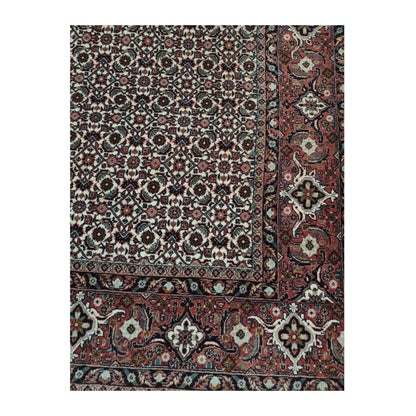 Detail of Persian Bidjar hand-knotted wool rug showing repeating field pattern and red border design, 257 x 250 cm