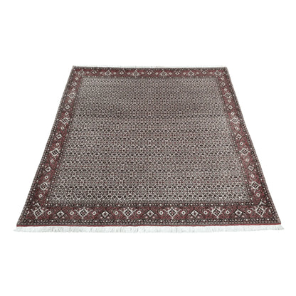 Full view of Persian Bidjar hand-knotted wool rug with dark brown patterned field and detailed red border, 257 x 250 cm