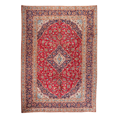 Persian Kashan hand-knotted wool rug 405 x 285 cm full view with red central medallion and blue floral border