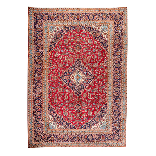 Persian Kashan hand-knotted wool rug 405 x 285 cm full view with red central medallion and blue floral border