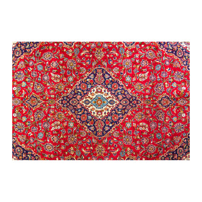 Central medallion detail of Persian Kashan wool rug showing red field, floral motifs and traditional Persian design