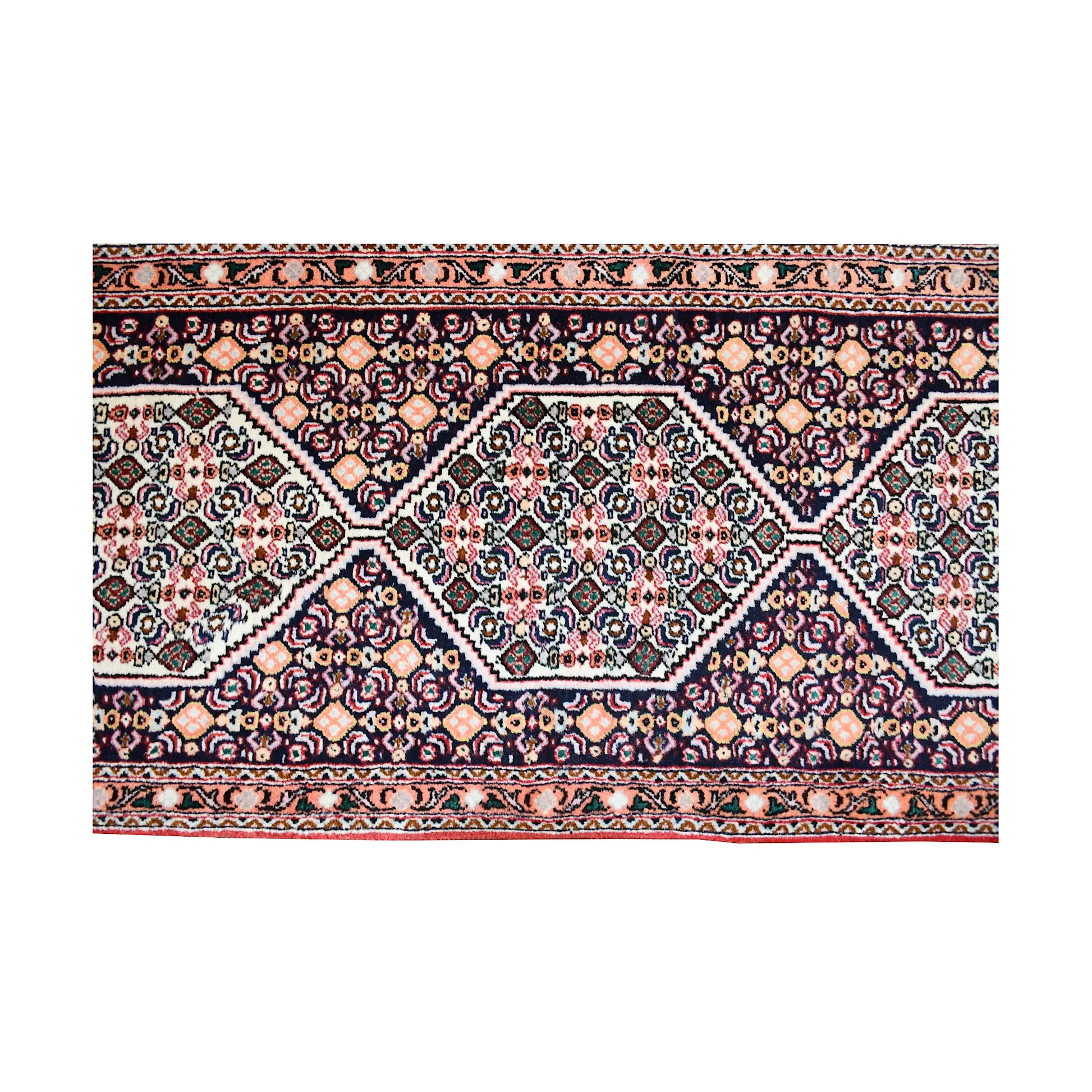 Diamond lattice detail of Persian Senneh runner with ivory linked medallions and intricate multicolour field pattern
