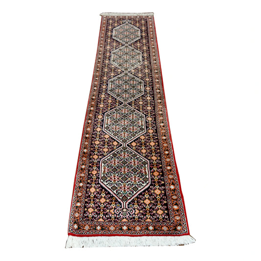 Persian Senneh runner 234 x 56 cm full view with indigo field, red border and fine diamond lattice pattern