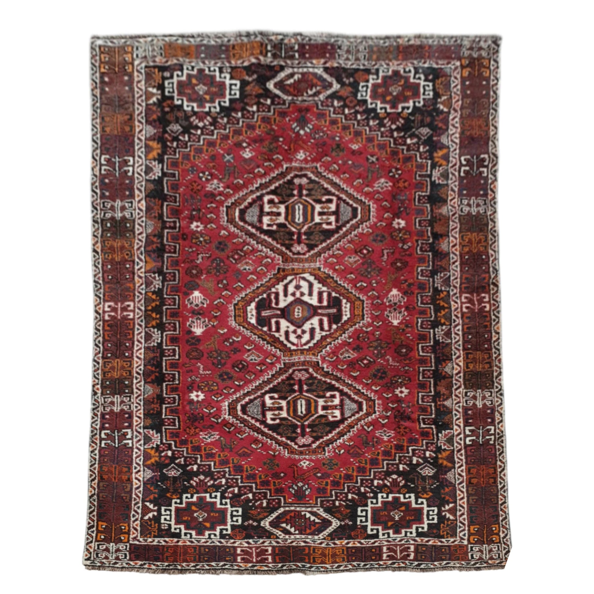Full view of Persian Shiraz hand-knotted wool rug with rich red field, three geometric medallions and layered borders, 252 x 160 cm