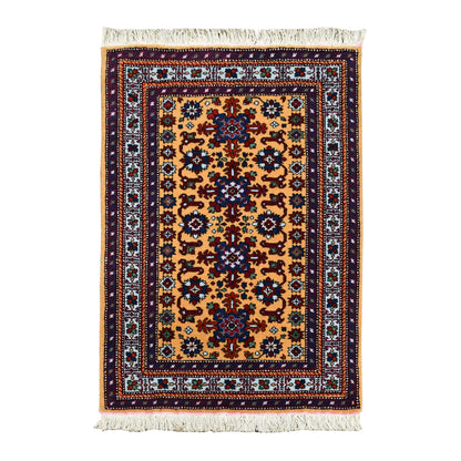 Full view of Persian Veramin hand-knotted wool rug with a camel-gold floral lattice field and layered red and blue borders, 126 x 76 cm