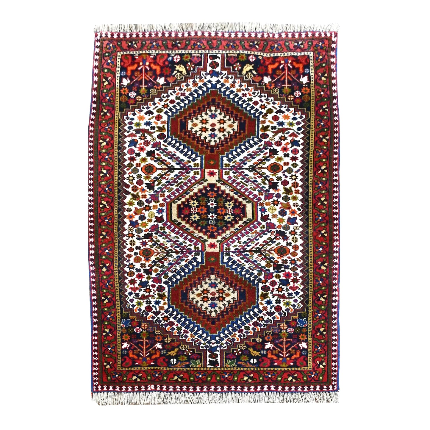 Full view of Persian Yalameh hand-knotted rug with three diamond medallions on an ivory field, 155 x 105 cm