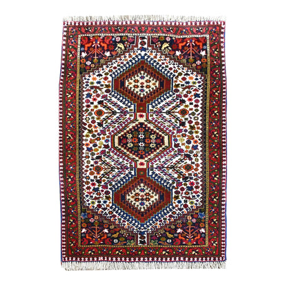 Full view of Persian Yalameh hand-knotted rug with three diamond medallions on an ivory field, 155 x 105 cm