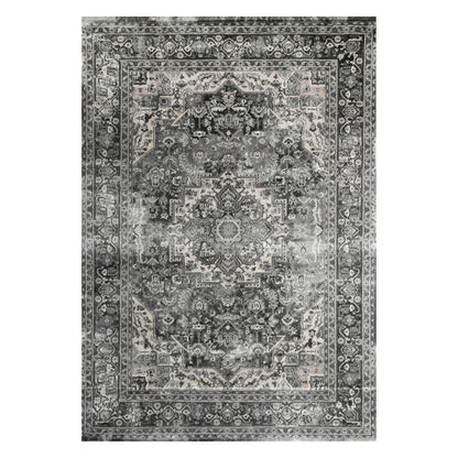 Full view of Prague Teresa Charcoal traditional rug with distressed medallion pattern and grey ornamental border, 170 x 120 cm