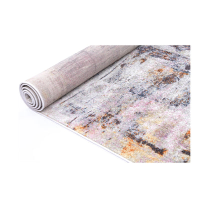 Rolled edge detail of Santa Fe Verada Abstract Rug showing soft pile, backing and abstract colour detail