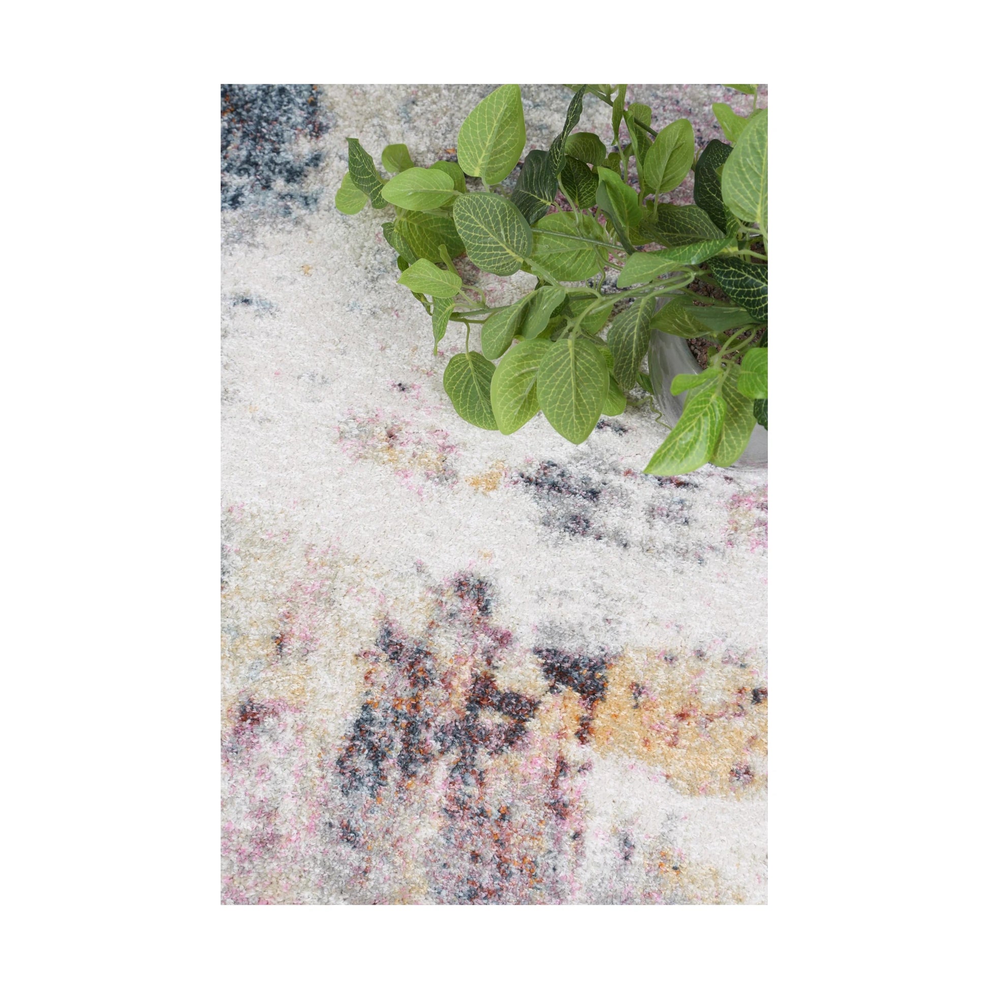 Texture detail of Santa Fe Verada Abstract Rug with cream, grey, blush and charcoal colour movement