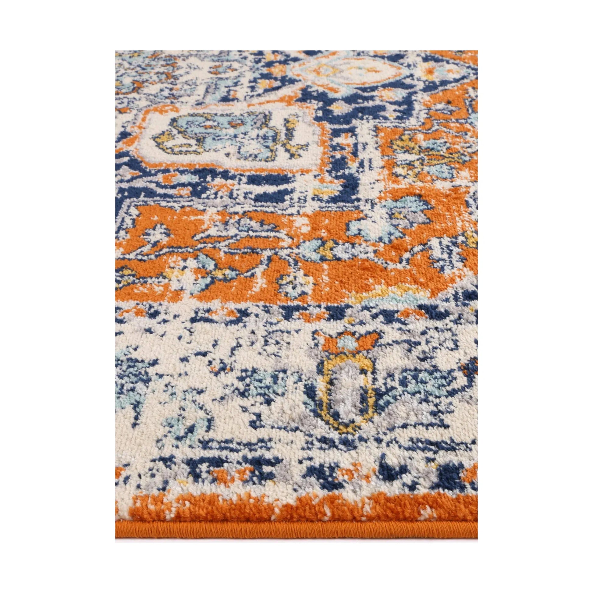 Close-up of Sicily Messina Orange and Blue rug showing polypropylene pile texture, blue orange pattern and distressed detail, 290 x 200 cm