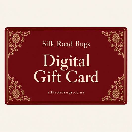 Silk Road Rugs Digital Gift Card with a burgundy background, ivory lettering and floral border.