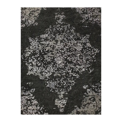 Close-up of round rug with silver and charcoal medallion design, 160 cm