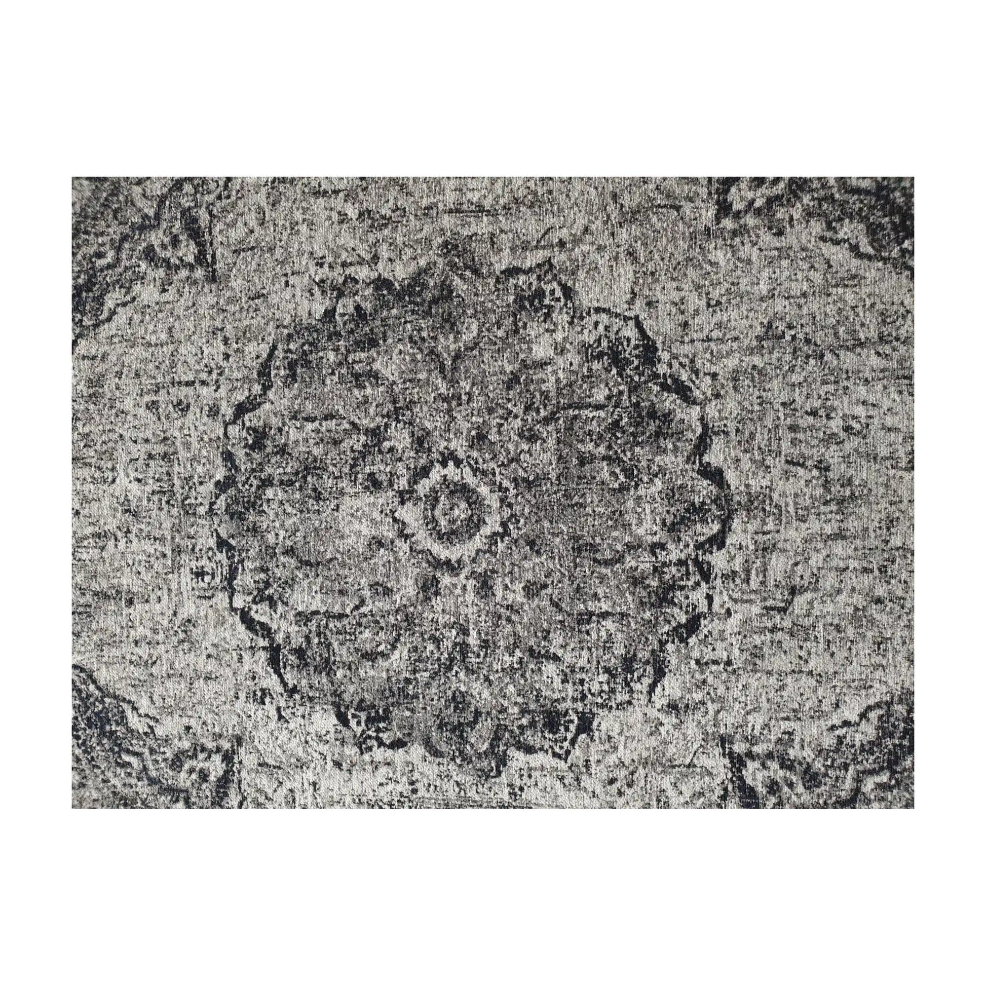 Close-up of steel round rug with distressed medallion detail, 160 cm