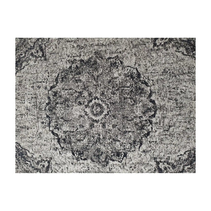 Close-up of steel round rug with distressed medallion detail, 160 cm