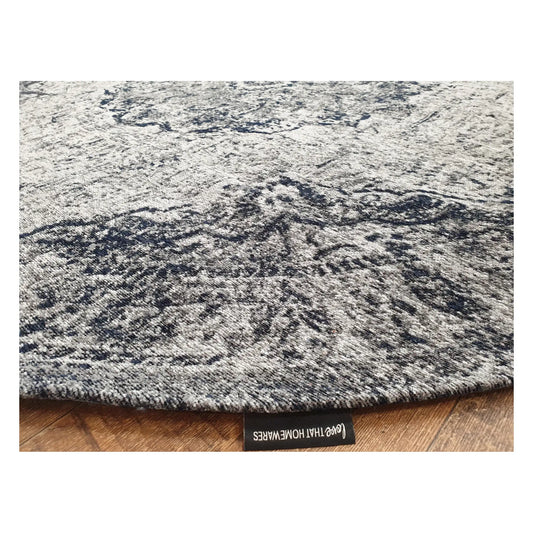 Close-up of steel round chenille polyester rug showing surface texture, 160 cm