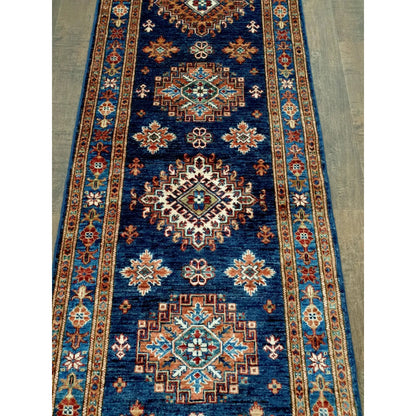 Super Kazak runner rug 295 x 75 cm length view showing repeating motifs