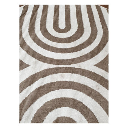 Close-up of taupe and ivory round rug with modern curved stripe pattern, 160 cm
