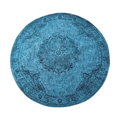Full view of teal round rug with distressed medallion pattern, 160 cm