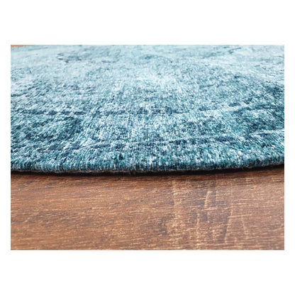 Close-up of teal round chenille polyester rug showing texture and distressed pattern detail, 160 cm