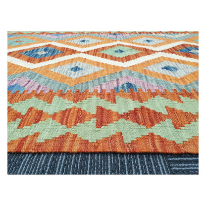 Low-angle close-up of Afghan Chobi Kilim showing wool flatweave texture and geometric border detail, 126 x 90 cm
