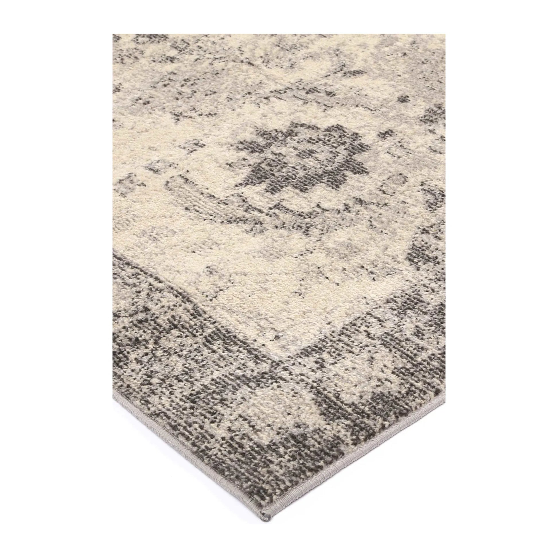 Corner detail of Tulin 12 Warm Cream and Grey transitional rug showing bound edge, border pattern and soft pile, 230 x 160 cm