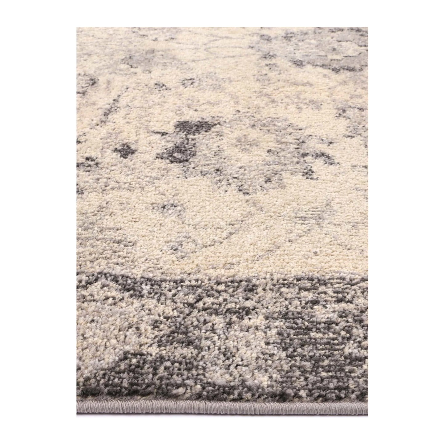 Close-up of Tulin 12 Warm Cream and Grey rug showing polypropylene pile texture and distressed traditional detail, 230 x 160 cm