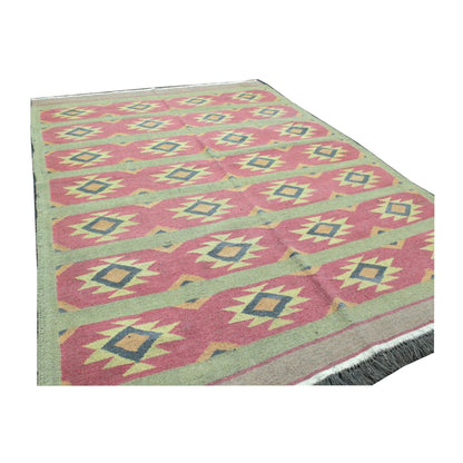 Angled field view of Turkish Kilim wool rug showing flatwoven texture and geometric pattern, 200 x 144 cm