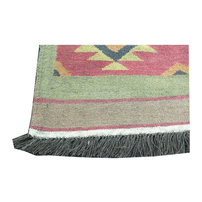 Fringe end detail of Turkish Kilim wool rug with sage green border, dusty pink field and charcoal fringe, 200 x 144 cm