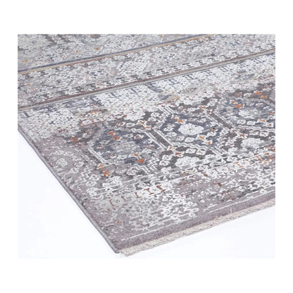 Close view of the patterned surface, edge and short self-fringe in grey, ivory and muted rust