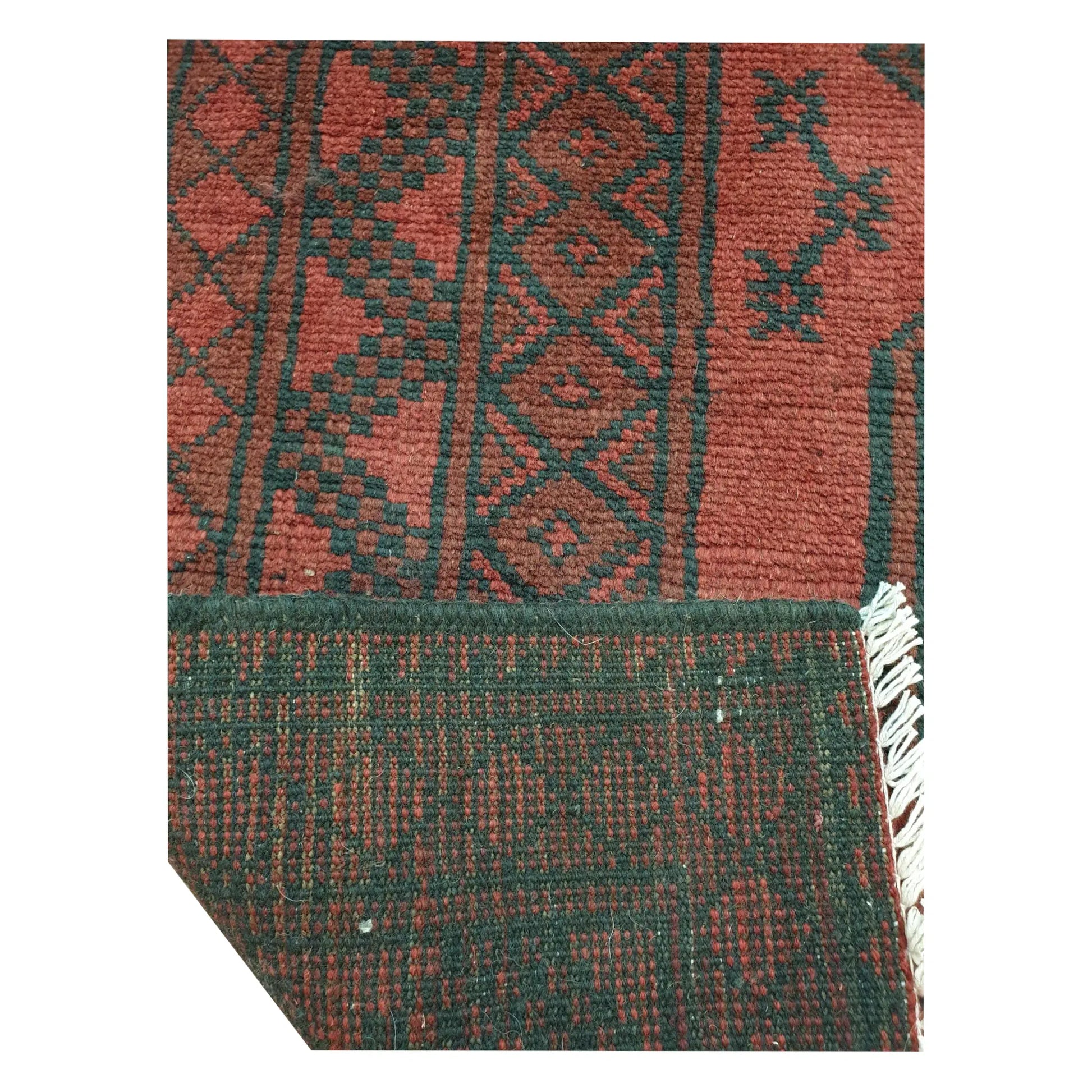 Close-up of Turkoman rug back and border detail showing geometric pattern and woven structure