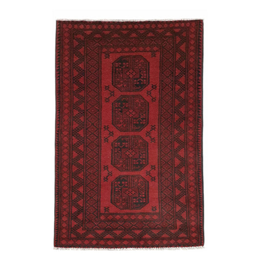 Turkoman hand-knotted wool rug 190 x 101 cm shown in straightened full view with deep red geometric gul design