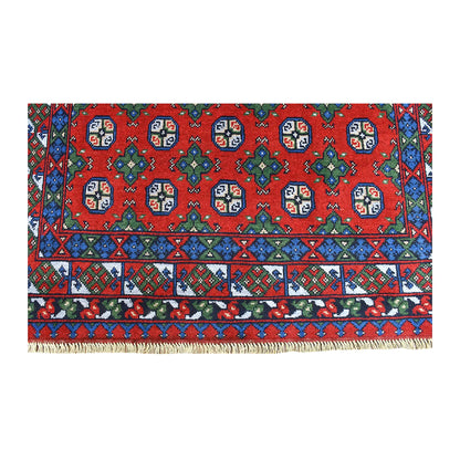 Fringe and end-border detail of Turkoman rug with small octagonal guls and layered blue, green and red geometric bands