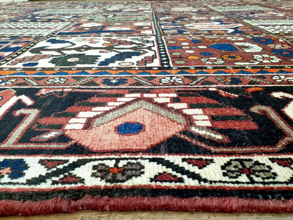 Border detail of vintage Bakhtiari hand-knotted wool rug